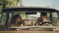 A still from the trailer featuring Carey and Ashley in a tense car scene. (Image via NEON)